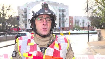 Burst water main floods residential road in Camden