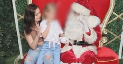 Mum left in tears after photographer told her to 'suck in' for Santa picture with her child