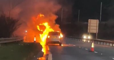 Heart-stopping moment car engulfed in flames after crash at Scots roundabout