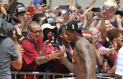 WATCH: Former Cavalier J.R. Smith goes shirtless in pregame guitar smash