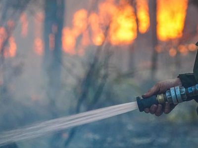 Perth bushfire downgraded to watch and act