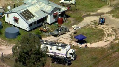 Two men charged with looting from property where Queensland police officers were shot