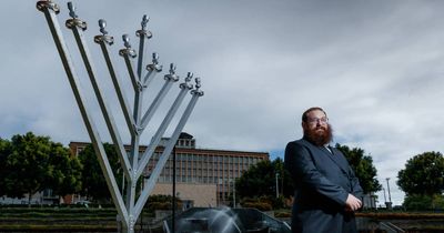 Hunter's Jewish community celebrates Hanukkah by lighting menorah in Civic Park