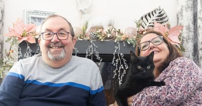 Lucky black cat taken in by couple who go on to win £1 million on National Lottery