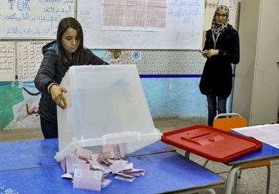 Tunisia uncertainty after poll snub, calls for president to quit