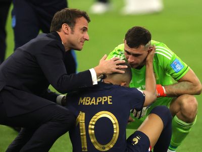 Emmanuel Macron: France president consoles players after World Cup final loss to Argentina