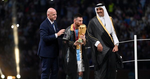 Lionel Messi forced to cover Argentina shirt to lift World Cup trophy as  Gary Lineker rages - Mirror Online