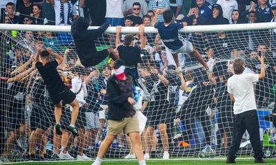 Three men charged over mass pitch invasion at A-League Men Melbourne derby