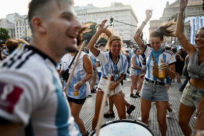 Argentina’s fans celebrate in the streets after World Cup victory