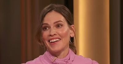 Hilary Swank shows off sweet baby bump in festive snap ahead of her twins' arrival