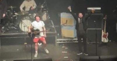 Kyle Falconer serenades Martin Compston on stage in Glasgow after missing wedding because he got arrested