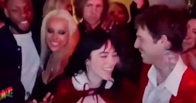 Billie Eilish's wild 21st as she dons sexy Santa suit and snogs boyfriend Jesse, 31