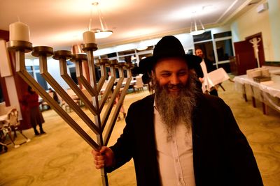 Hasidic Jewish refugees from Ukraine celebrate Hanukkah at Hungarian shelter