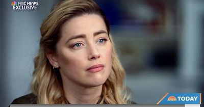 Amber Heard says 'my life is destroyed' as she pays $1million to Johnny Depp in damages