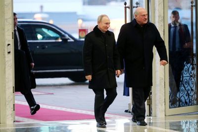 Putin insists no plan to absorb Belarus on visit in Ukraine shadow