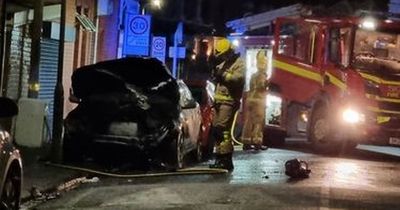 Car ripped apart by fire as emergency services block road