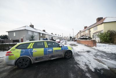 Woman charged with murder of two boys, aged 2 and 5