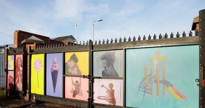 West Belfast art initiative transforms area by bringing life to old black gates
