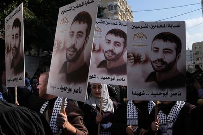 Palestinians call for strike after prisoner dies of cancer