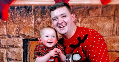 Sassy tot refuses to pose in first Christmas shoot so desperate dad has to hide under blanket