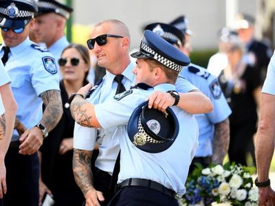 'Our hearts go out' to officers' families