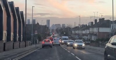 Police shut road in Salford after two-car crash