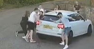 Terrifying moment 'immature' man crashes Audi into crowd of pub drinkers