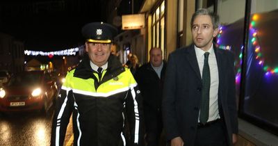 Minister for Justice walks streets of Rathkeale amid feud violence and armed garda patrols