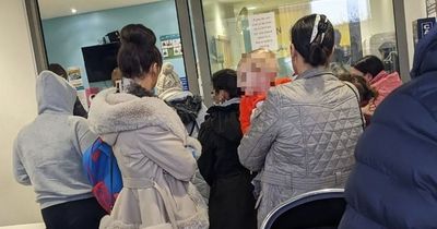 Dad describes 'war zone' in children's hospital with kids lying everywhere and queues out the door