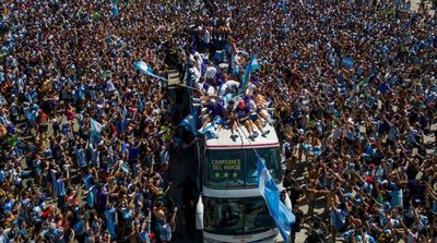 Argentina’s World Cup Heroes Airlifted in Helicopters as Street Party Overflows