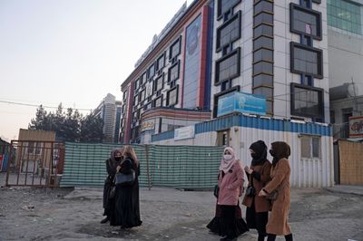 'Hugs, screams and cries': Afghan women anguished at university ban