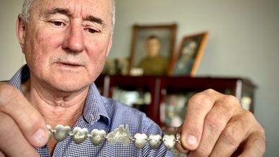 Metal detectorist finds long-lost WWII sweetheart bracelet in Tasmanian front yard