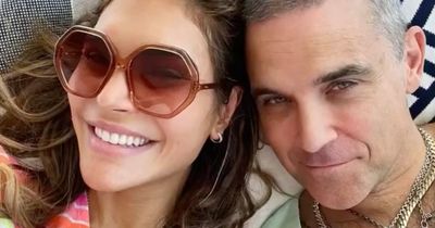 Robbie Williams' wife Ayda jokes couple have 'threesomes' with his laptop