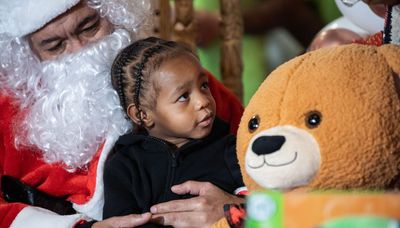 Toddler found in apartment with bodies of mother, grandfather gets visit from Santa