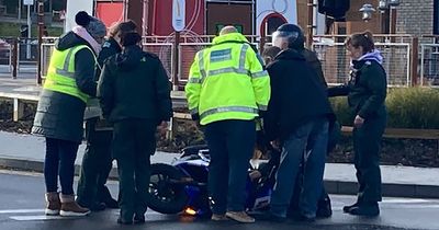 Paramedics on picket line rush to help motorcyclist who fell off his bike