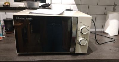 Woman fuming as brand new Tesco microwave costing £70 arrives covered in dirt and rust