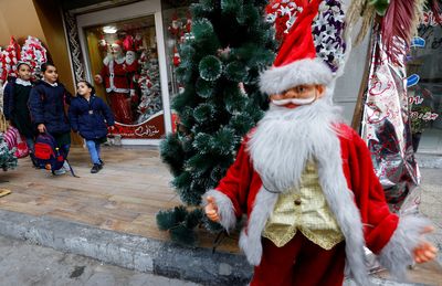 Gaza Christians say travel curbs separate families at Christmas
