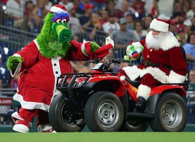 Here Are All the Times Your Favorite Mascots Dressed Up as Santa