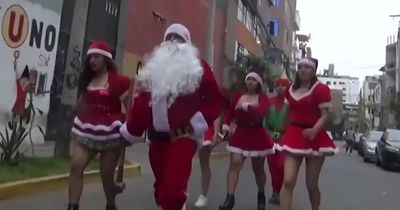 Cops dressed as Father Christmas and elves bust drug kingpin dubbed 'the Chicago Grinch'