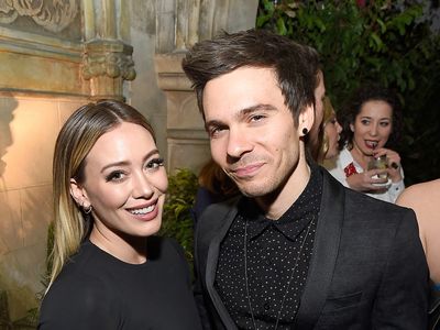 Hilary Duff and husband Matthew Koma are held hostage by their children in funny Christmas card