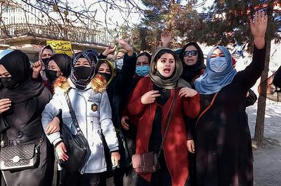 Afghan women banned from university 'for not following dress code'