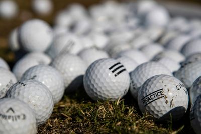 A ruling which awarded a Massachusetts couple around $5 million for damages done by wayward tee shots was overturned