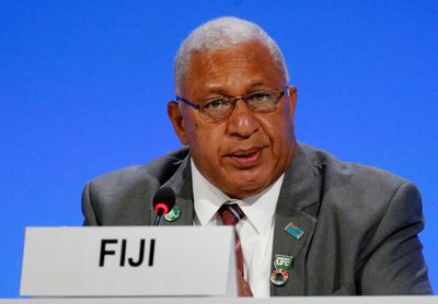 Fiji's king-maker party votes to support opposition coalition as military remains on call
