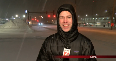 An Iowa TV sports reporter had to cover a blizzard and looked completely miserable doing it