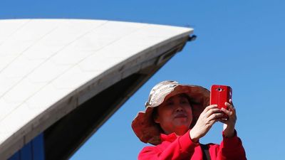 Tourism operators hope Chinese visitors will return in 2023 despite signs of 'turbulent' year for travel