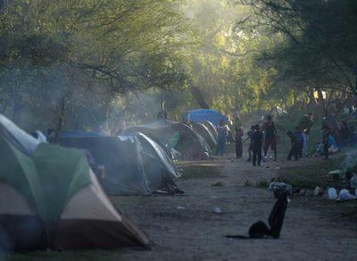 Migrants near US border face cold wait for key asylum ruling