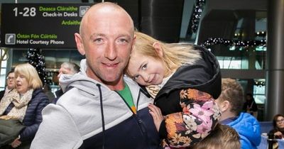 Families smile with tears of joy as they are reunited in Dublin Airport