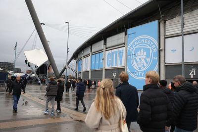 Man City and Liverpool condemn ‘wholly unacceptable’ incidents after fan injured and coins thrown