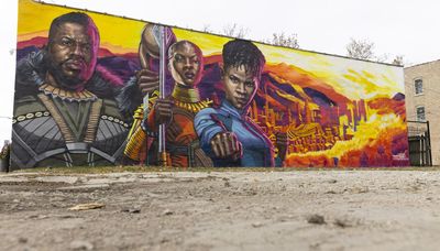 For Chicago artist Rahmaan Statik, painting ‘Black Panther’ murals was ‘a childhood dream come true’