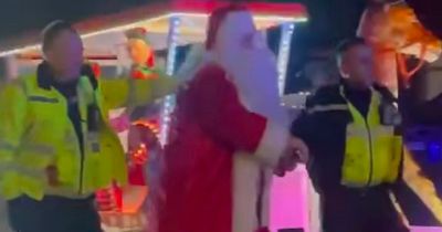 Onlookers confused as Santa 'arrested' in front of shocked Christmas crowds